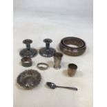 A quantity of Norwegian Silver including weighted candlesticks and a white metal ring marked with