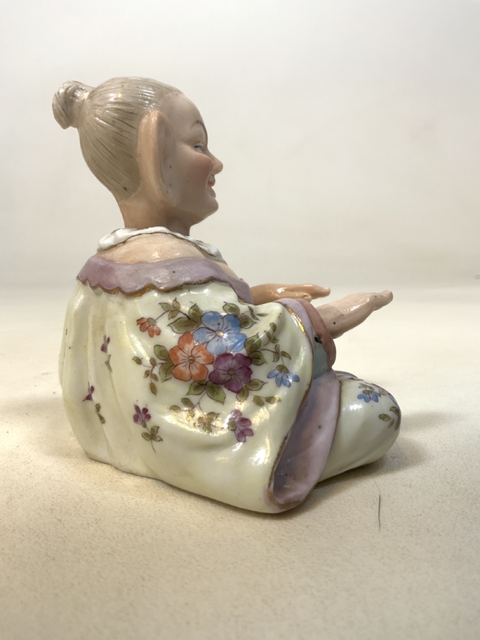 A 19th century porcelain Mandarin nodding hands and head figurine with blue factory anchor mark. - Image 4 of 7