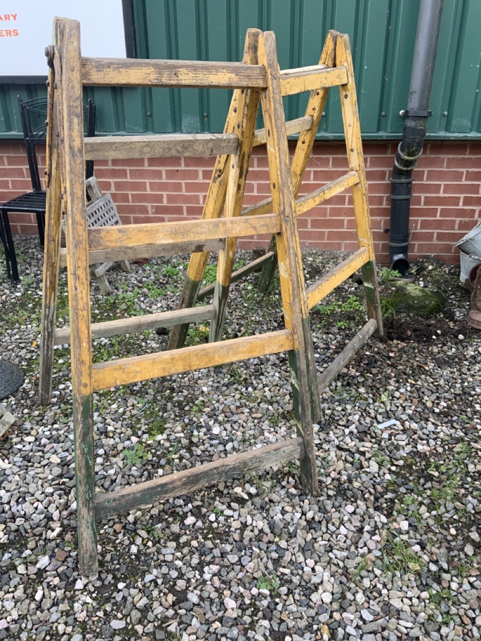 A pair of Victorian pine trestle stands with original paintwork. W:62cm x H:142cm