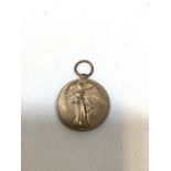 A World War 1 Victory medal, marked PTE SJ Gulley 22 London