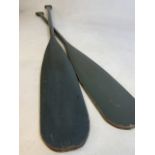 A Near pair of military style wooden paddles. With impressed dates and military style arrow. H: