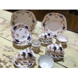 A bone China early twentieth century tea set comprising 2 cake plates, jug, bowls, 6 cups and