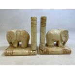 A pair of Spanish alabaster large elephant bookends. W:17.5cm x D:11cm x H:20cm