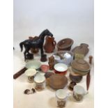 A mixed box of ceramic and glass items including, studio pottery, leather horse, Poole pottery,