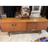 A G Plan mid century teak sideboard. (A.F top with large water stain see photos) four drawers