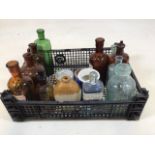 A crate of assorted vintage chemist bottles