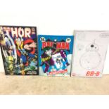 Three framed comic posters. Largest W:63cm x H:94cm