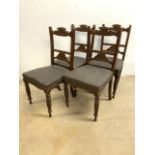 Four oak dining chairs, with carved back, turned legs and seats with stud work finish. Seat height