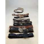 A quantity of mainly leather ladies belts