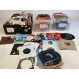 A large collection of 45 rpm vinyl 60s 70s 80s Pop to include: T. Rex, Fleetwood Mac, ABBA, Cliff