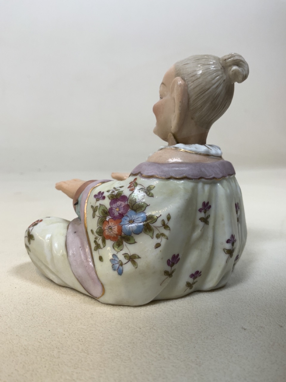 A 19th century porcelain Mandarin nodding hands and head figurine with blue factory anchor mark. - Image 3 of 7