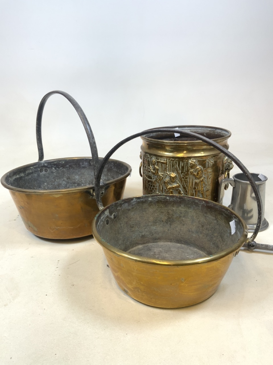 Two large antique brass jam preserve pans also with a brass hammered jardinaire, pewter tankard etc.