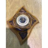 An early 20C barometer in pretty hand carved mount W:37cm x H:29cm