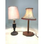An Art Deco table lamp also with a Japanned and embossed table lamp.