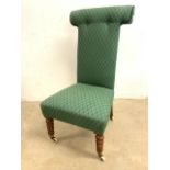 A Victorian prayer chair with graduated bobbin tuned front legs and ceramic castors. H:37cm