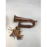 A copper and brass horn W:31cm
