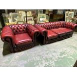 An ox blood red leather button back three seater chesterfield sofa also with an armchair. W:200cm