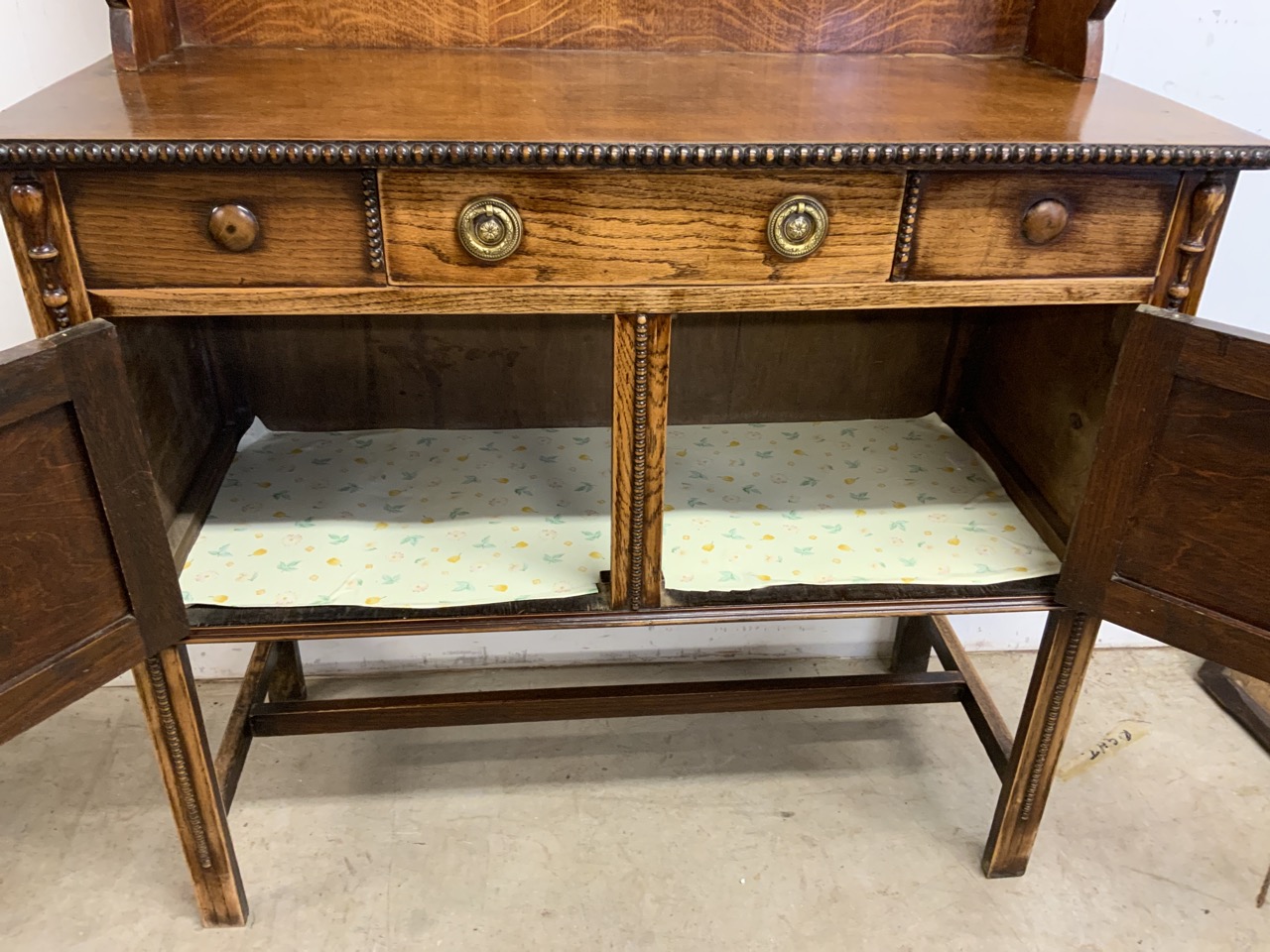 A two piece oak early 20th century dresser, base with central drawer above two cupboard, the top - Image 5 of 8