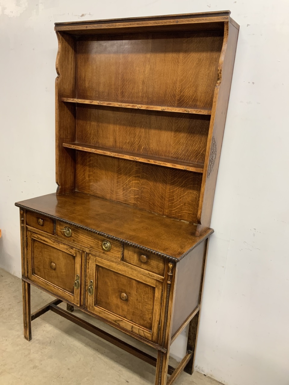 A two piece oak early 20th century dresser, base with central drawer above two cupboard, the top - Image 3 of 8