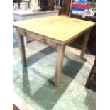 An antique pine kitchen table with drawer to one side. W:120cm x D:89cm x H:77cm
