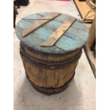 An old barrel with cover A/F W:46cm x H:50cm