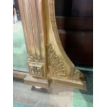 A large antique giltwood framed overmantle mirror with large bevel on ceramic bun feet. W:155cm x