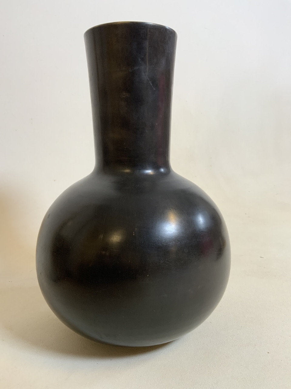 A Large bronze oriental vase with bulbous base H:31cm