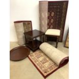 A selection of modern furniture and rugs.