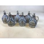 Buchan stoneware decanters - 6 including Amontillado, Brandy, Scotch, Gin, Sherry and Whisky and a