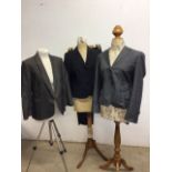 A three piece black Paul Smith suit includes skirt, trousers and jacket size 46, a grey check Paul