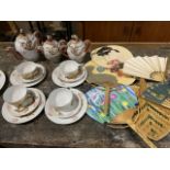 A sixteen piece Japanese tea set also with various Oriental style fans