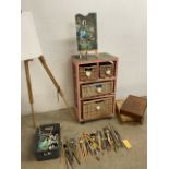 A Large collection of artist materials, paints (mostly oils) and brushes, art boxes, easels, in