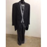 A vintage morning suit, jacket 100% wool by Moss Bros size 48r, also with silk waistcoat by Toye,