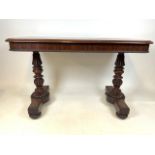 A Regency rosewood library table, similar examples supplied by Gillows to William the 4th Earl