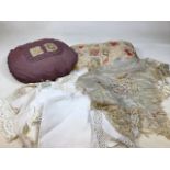 A two embroidered vintage cushions , a hand embroidered silk shawl and household linen. Domestic