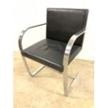 A Brno stainless steel designer chair with black leather upholstery. Seat height H:44cm Back
