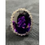 A continental 18k white gold, diamond and amethyst dress ring size n. A Statement piece. Stone