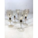 A set of Eight hand made Murano red wine glasses with gold fleck made by Pauly and Cie Compagnia