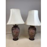 A pair of oriental ceramic lamps in H:39cm to top of base