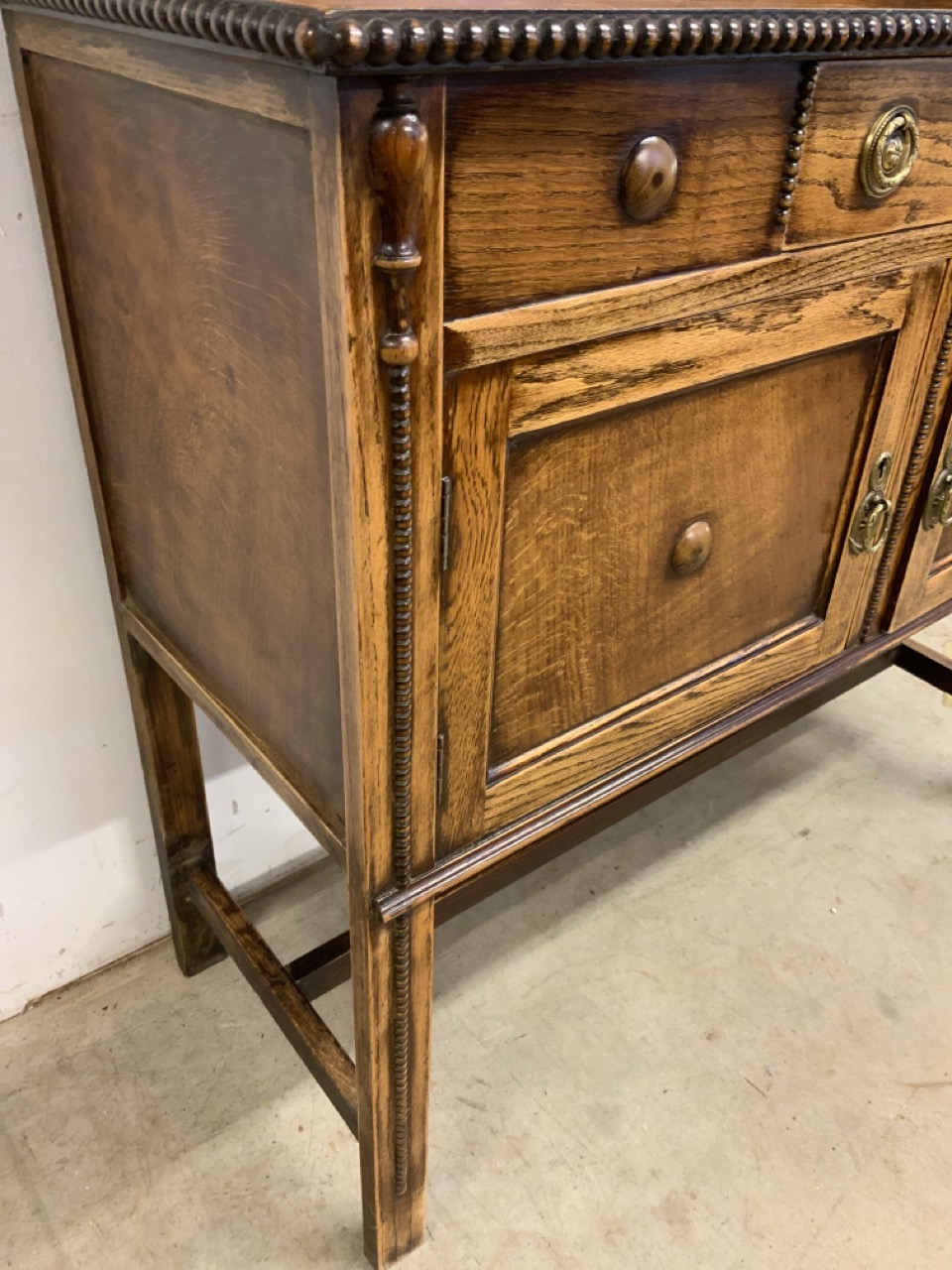 A two piece oak early 20th century dresser, base with central drawer above two cupboard, the top - Image 6 of 8