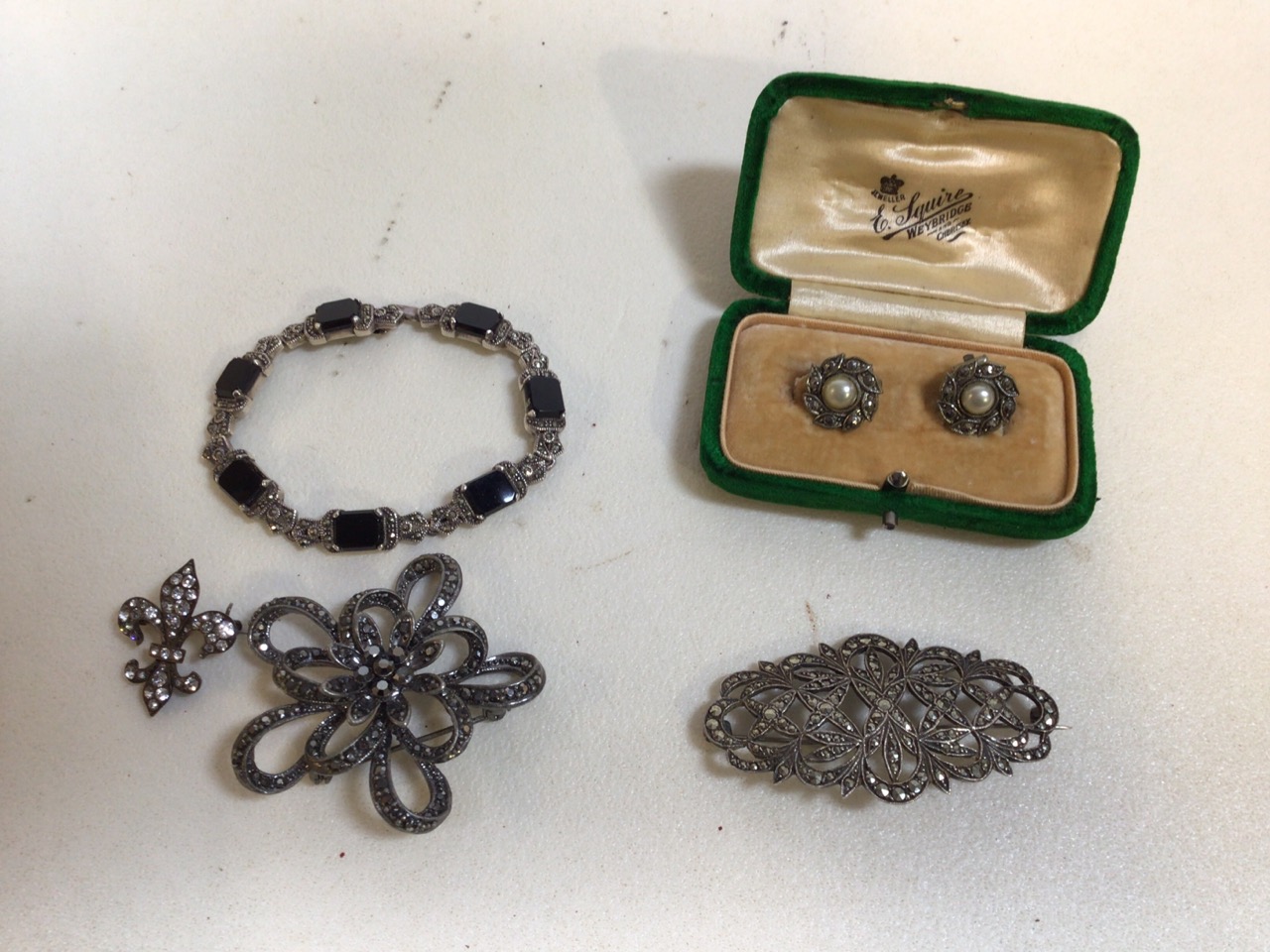 A silver marquesite bracelet and brooch and other white metal marquesite items