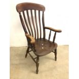 An elm seated farmhouse Grandfather chair.