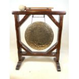 An early 20th century pitch pine gong. W:58cm x D:29cm x H:78cm