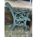 A pair of painted bench ends and painted metal garden table ends W:58cm x H:48cm bench ends W:65cm x