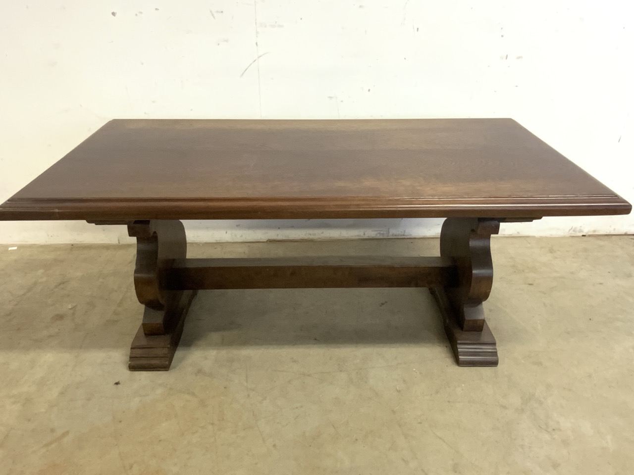 An chunky oak coffee table with 4 cm thick top with meaty stretcher to base. W:123cm x D:60cm x H: