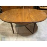 A G Plan teak extending dining table with fold out extra leaf. W:168cm x D:122cm x H:73cm