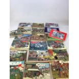 A quantity of vintage Giles annuals from the 1960s through to the 2000s