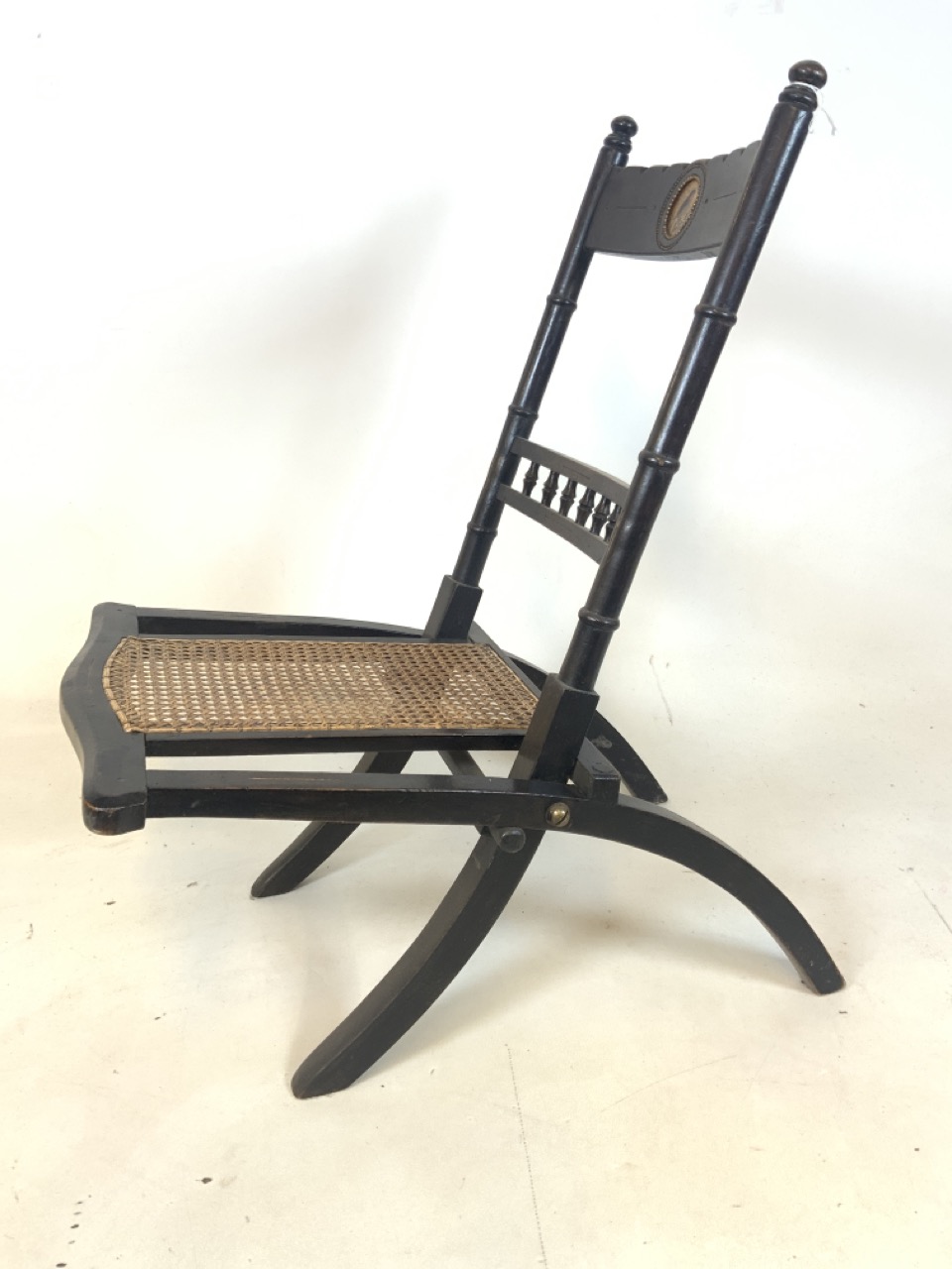 A Late 19th century folding rattan childs or nursing chair with bird illustration in circular - Image 2 of 6