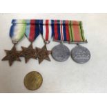 A group of five medals with one other includes, the France and Germany star, The Atlantic Star,