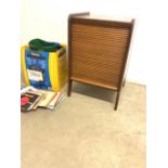 A Tambour fronted record cabinet also with a collection of vinyl. W:46cm x D:40cm x H:67cm